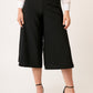PANTALÓN STRETCH AMPLIO LARGO MIDI CON ABERTURAS LATERALES Y DETALLES EN ENCAJE MONTIJO