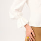 BLUSA CAMISERA CON ESCOTE BARDOT  Y BOTONES MANGA LARGA SORBONA