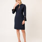 VESTIDO FORMAL RECTO DE MANGA LARGA CON BOTONES DORADOS HAUSSMAN