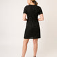 VESTIDO NEGRO FORMAL DE TWEED CON TAPETAS Y ALETILLAS EN SATÍN IVORY LOUVRE VISTA ESPALDA