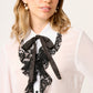 BLUSA CAMISERA BLANCA DE GASA MANGA LARGA CON OLÁN Y CORBATÍN NEGRO  Y BOTONES MONTIJO