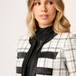 CHAQUETA FORMAL DE TWEED BLANCO Y NEGRO CON DETALLES EN SATÍN MONTIJO