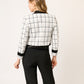 QUETA FORMAL DE TWEED BLANCO Y NEGRO CON DETALLES EN SATÍN MONTIJO VISTA ESPALDA