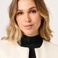 ABRIGO SEMI LARGO MINIMALISTA DE PAÑO COLOR IVORY CON BOLSILLOS TIPO CANGURO RIVOLI
