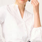 BLUSA BLANCA DE ALGODÓN CON CUELLO MAO, MANGA LARGA CON ABERTURA Y BOTONES VISIR