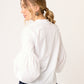 BLUSA BLANCA DE ALGODÓN MANGA LARGA CON ABERTURA Y BOTONES VISIR VISTA ESPALDA
