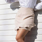 MINI FALDA CASUAL COLOR BEIGE BELLE ÈPOQUE
